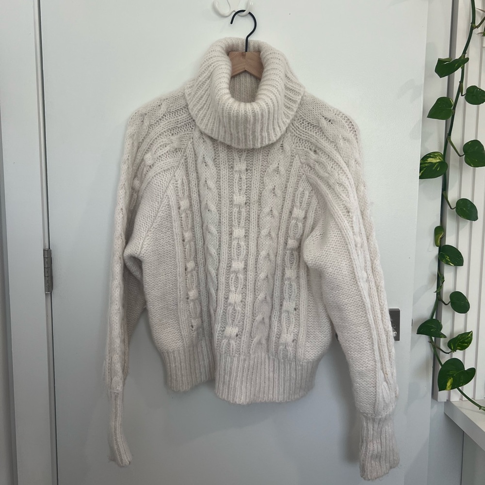 Cableknit sweater